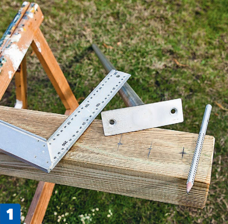 Bygge treningsrom i hagen: Mål opp til hull til stang og beslag