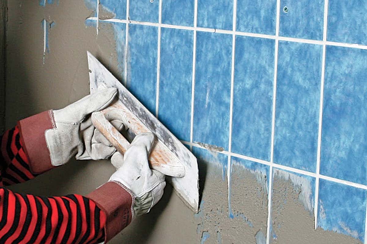 Dæk fliserne med puds