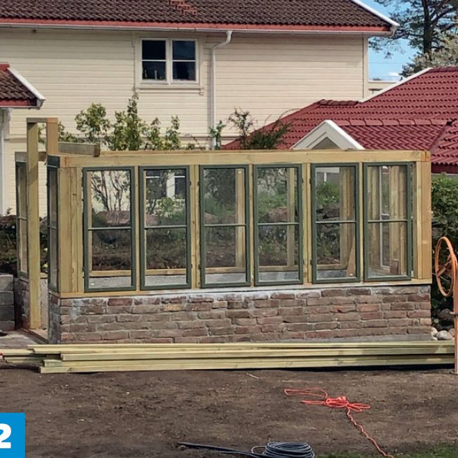 Drivhus av gamle vinduer