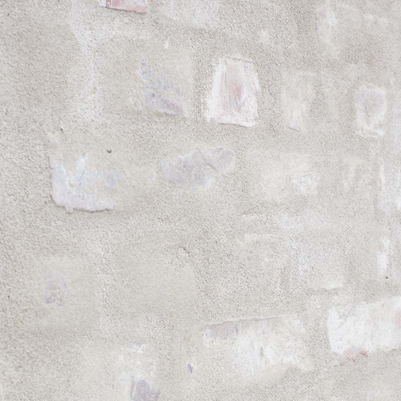 Murpuss: Enkelte murstein er synlige