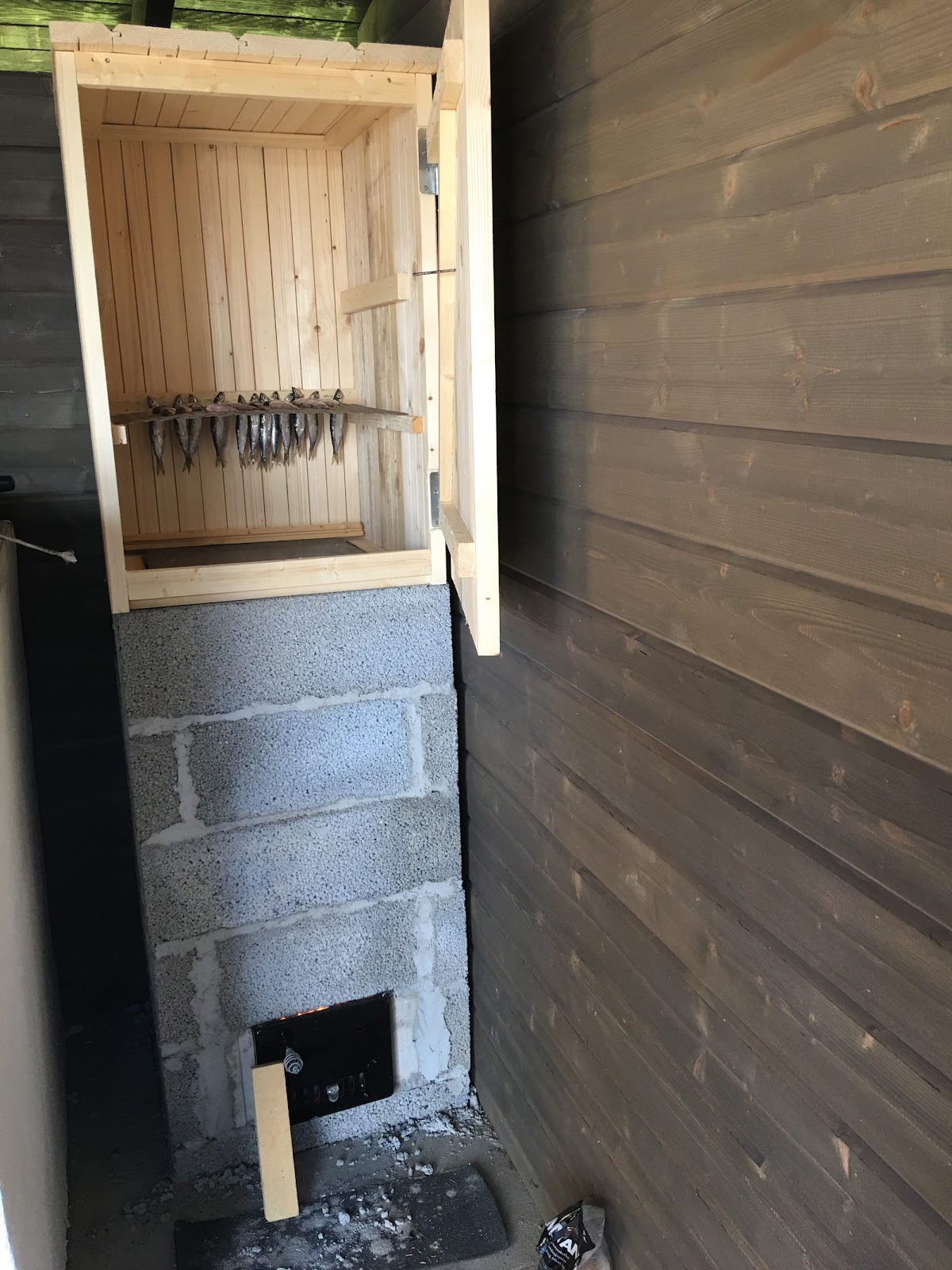 Udekøkken med pizzaovn og røgeovn