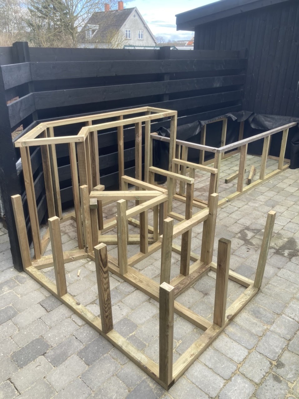 Udendørslounge med plantekasser