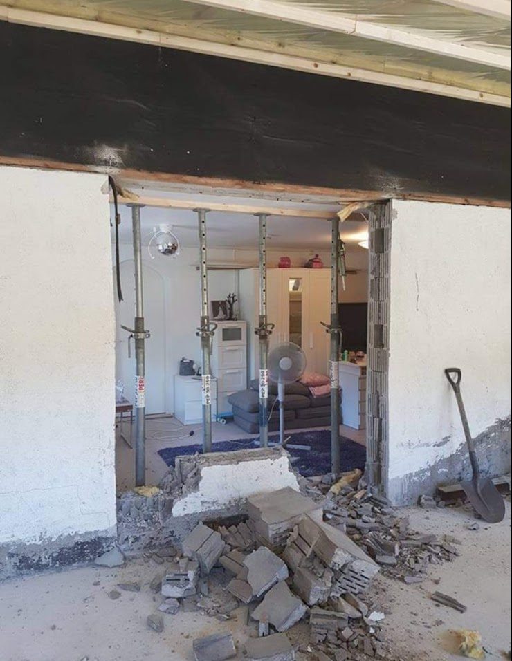 Tilbygning og overdækket indgang