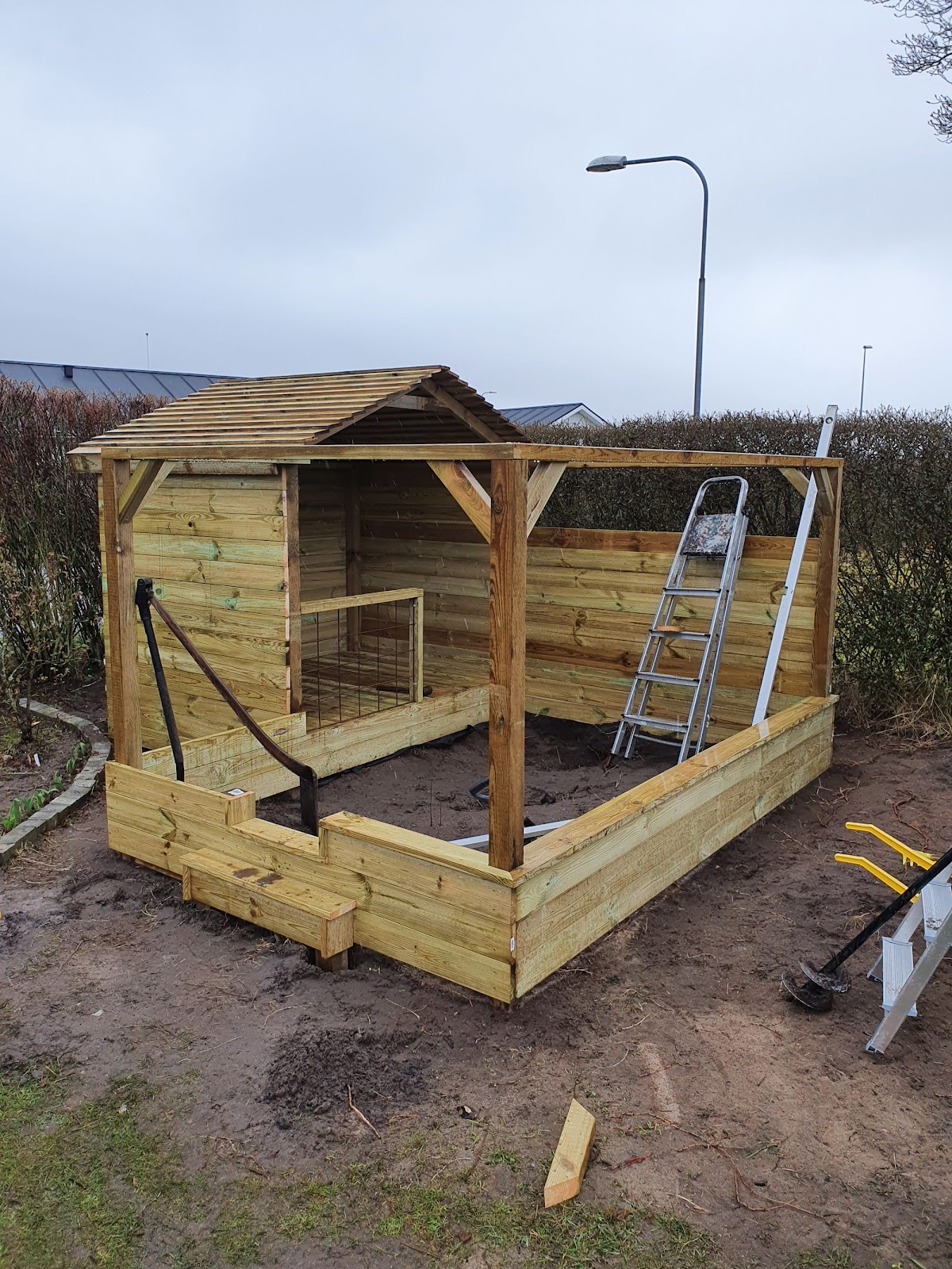 Legehus med sandkasse