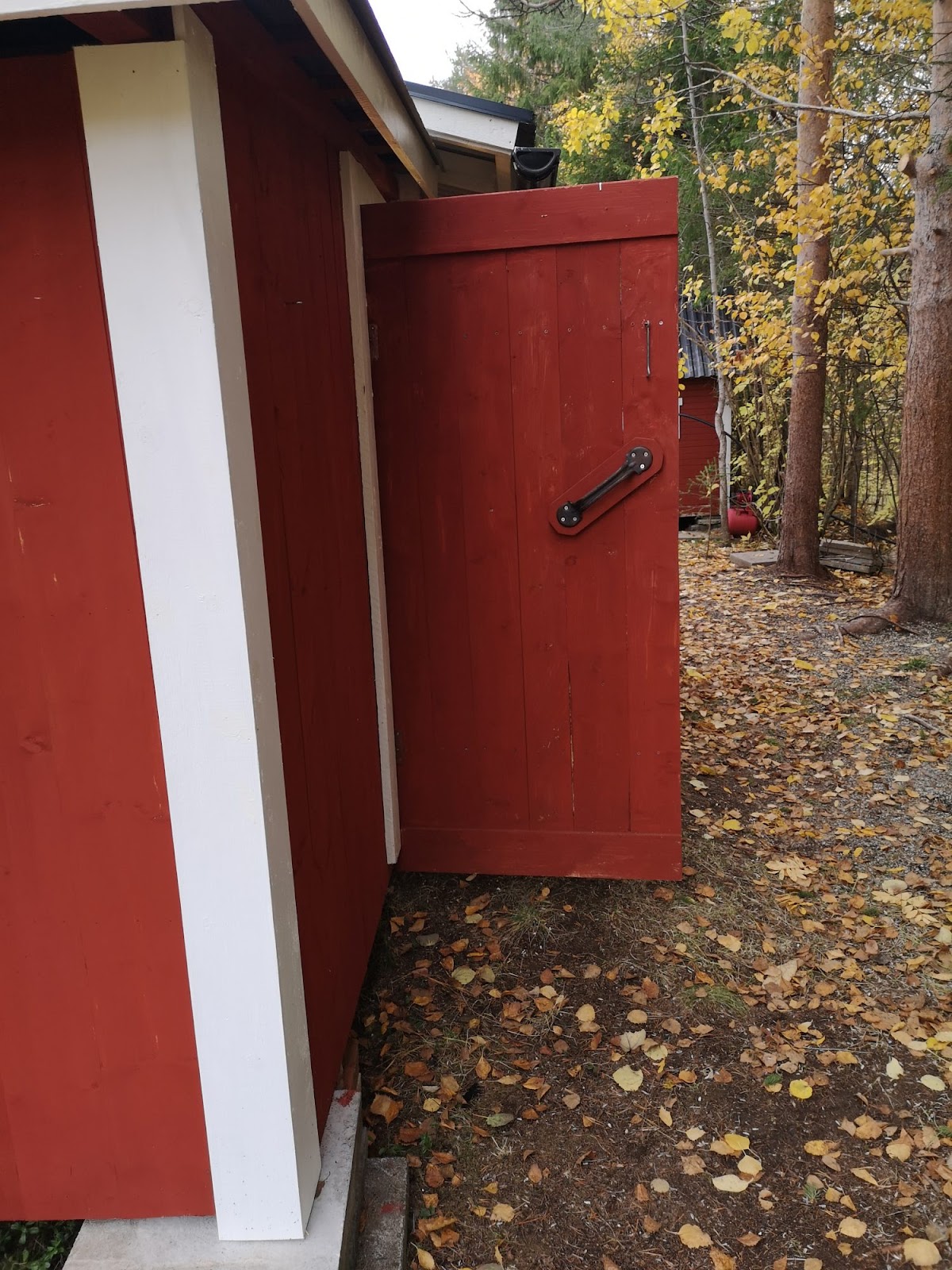 Brændeskur i hyttestil