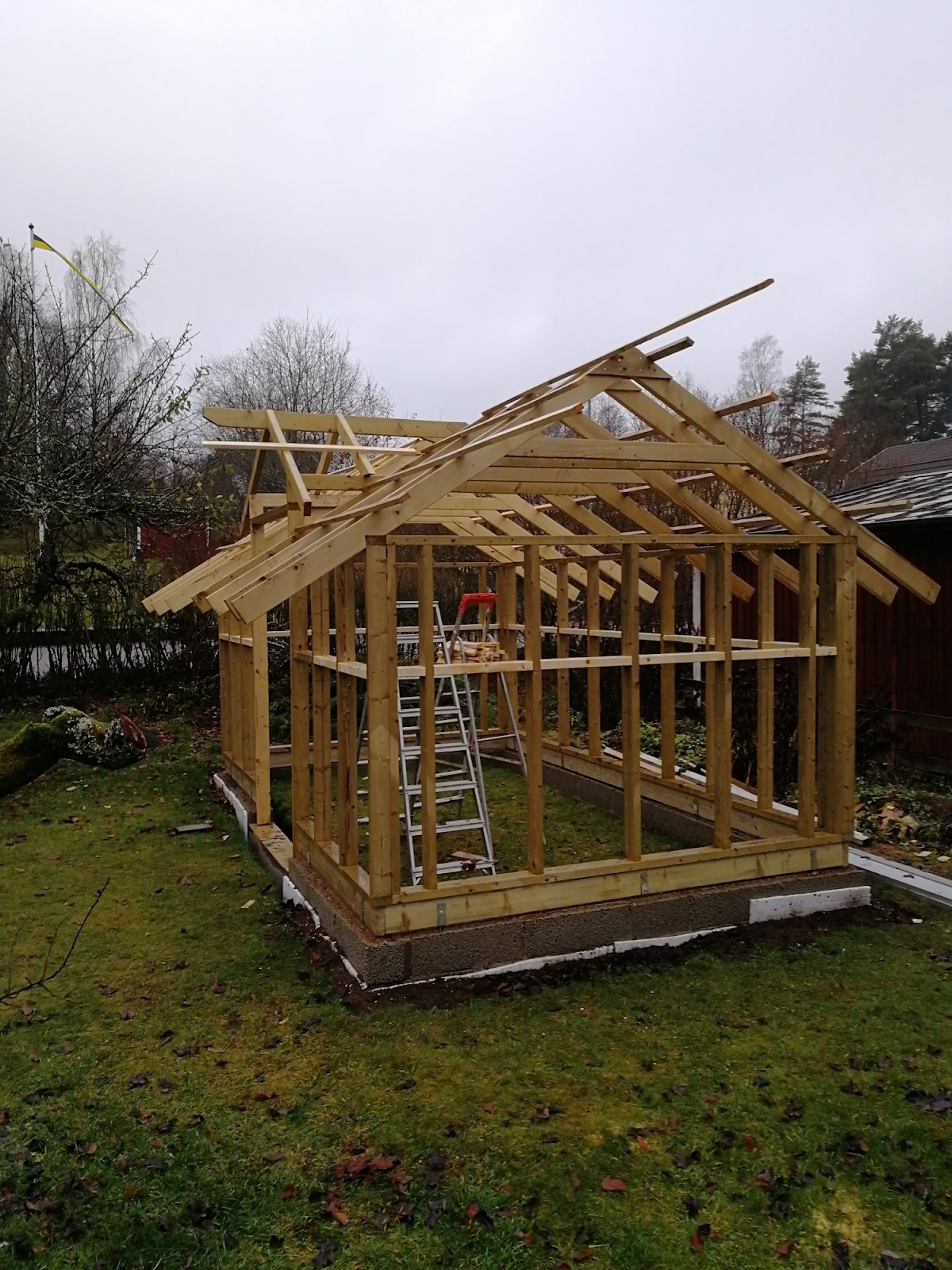 Drivhus af løst tømmer