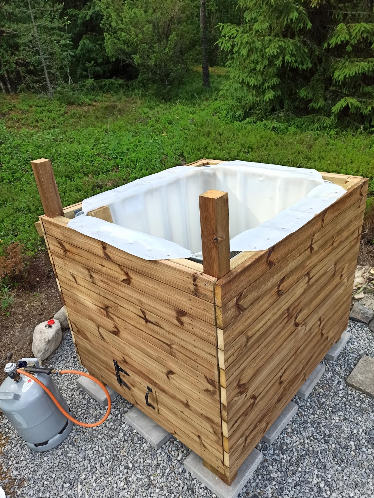 Vildmarksbad i vandtank