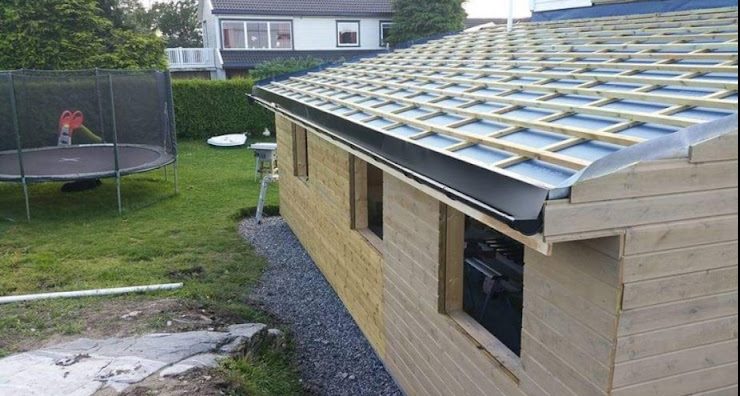 Laajennus ja katettu sisäänkäynti