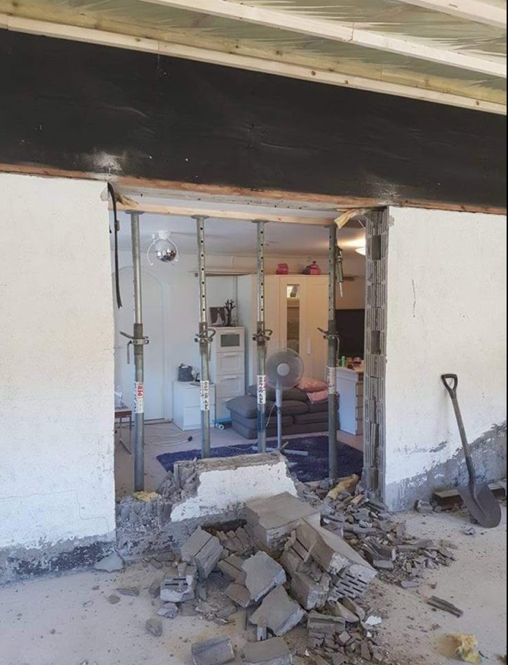 Laajennus ja katettu sisäänkäynti