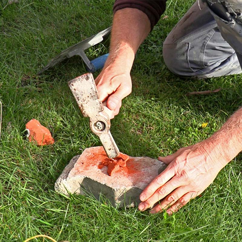 Reparere hull i murvegg ute