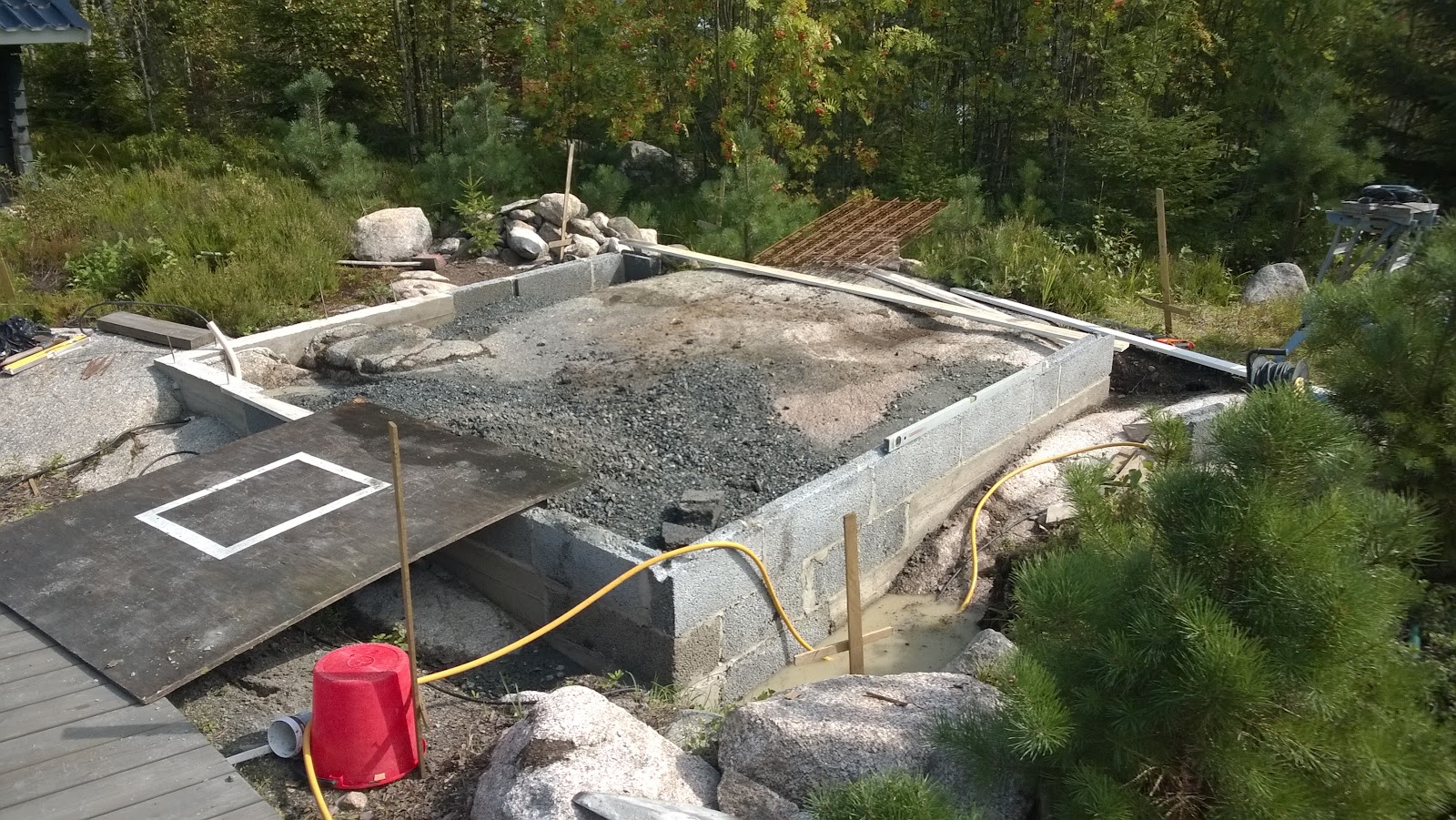 Utekjøkken med pizzaovn og røykovn