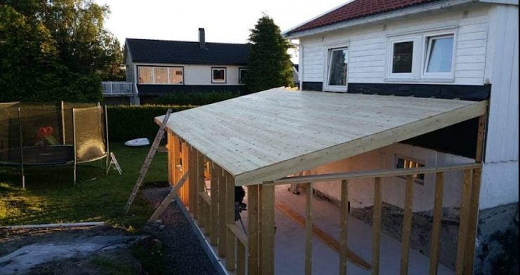 Tilbygg og overbygd inngangsparti