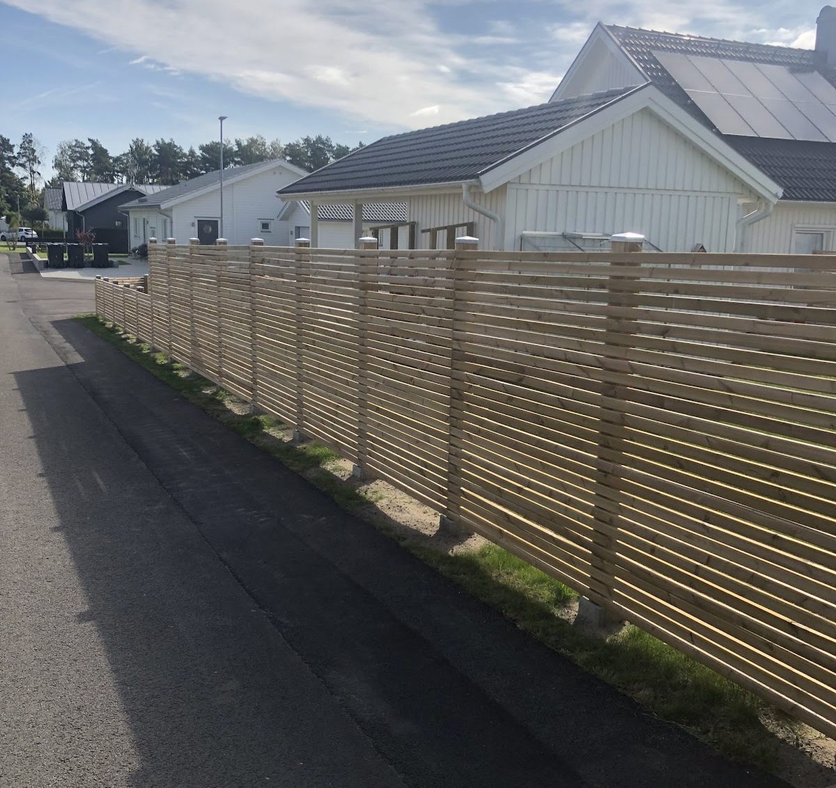 Plank vid tomtgränsen