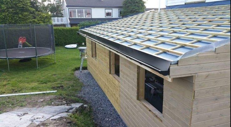 Tillbyggnad och täckt entré Initial