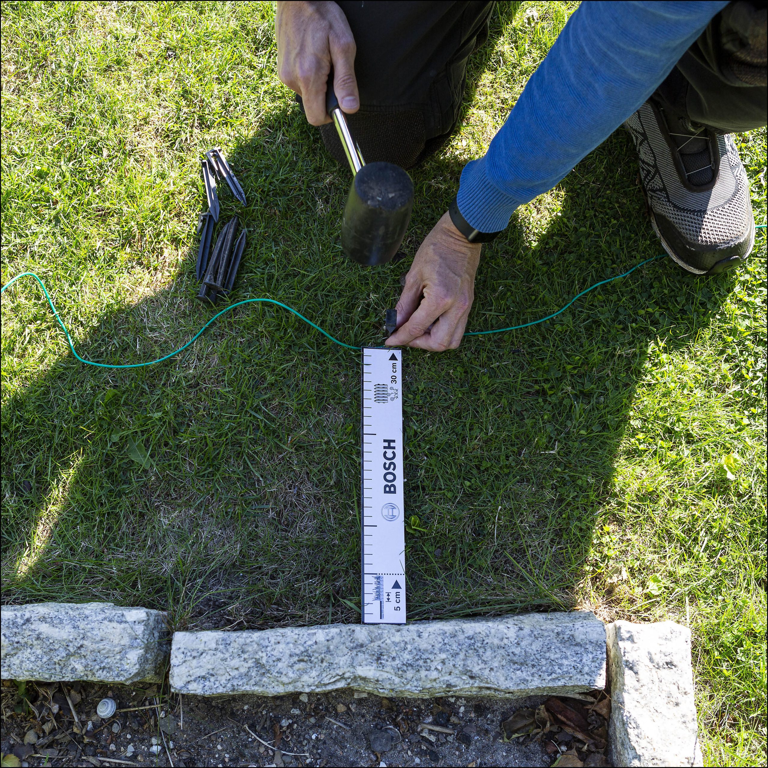 Legg ut avgrensningskabelen