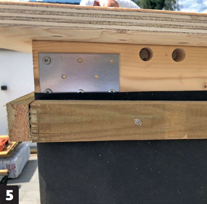 Isoleret skur med listebeklædning