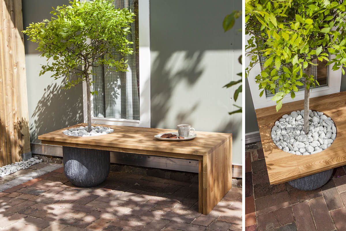 Havebænk med blomsterkumme