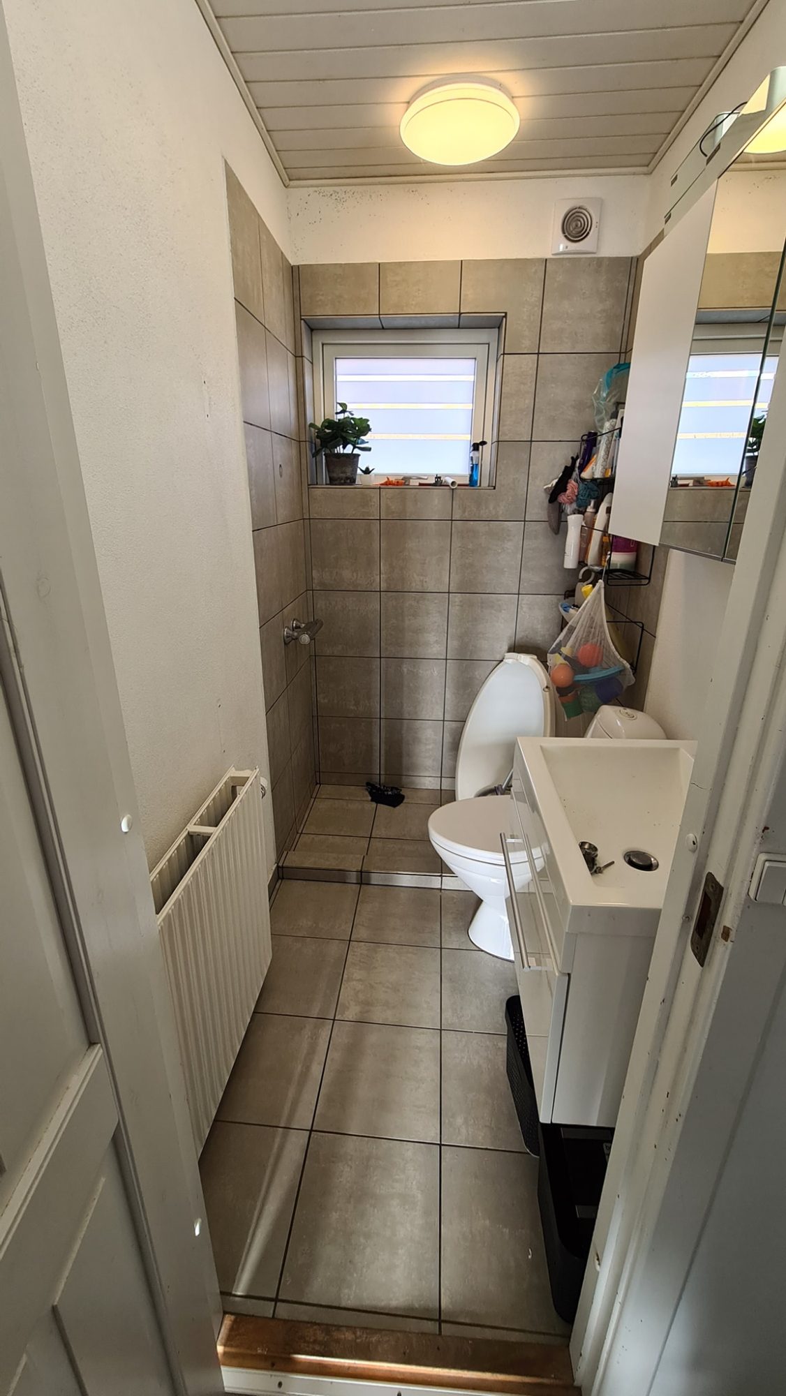 Kylpyhuoneen laajennus