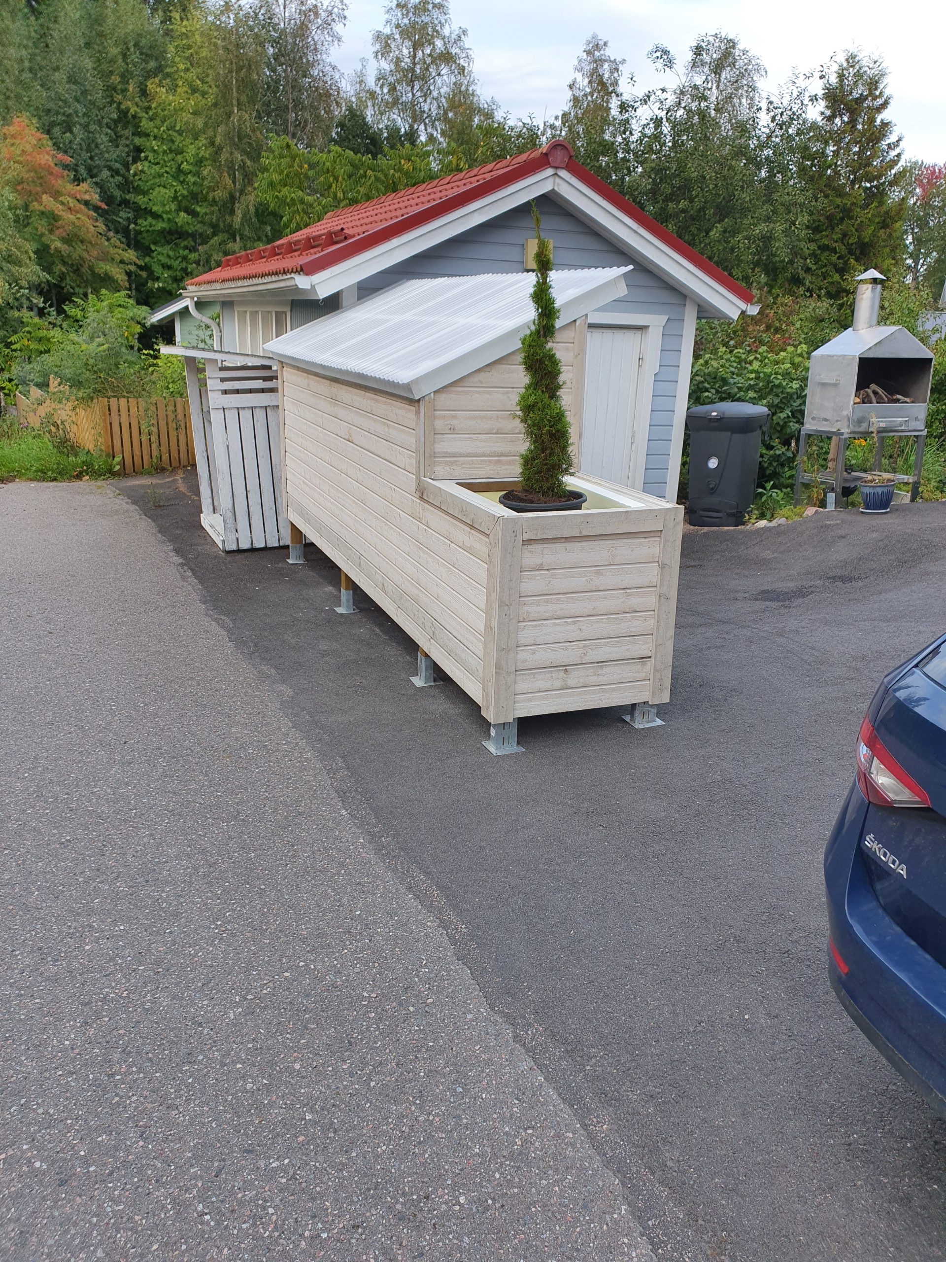 Plank med vedförvaring