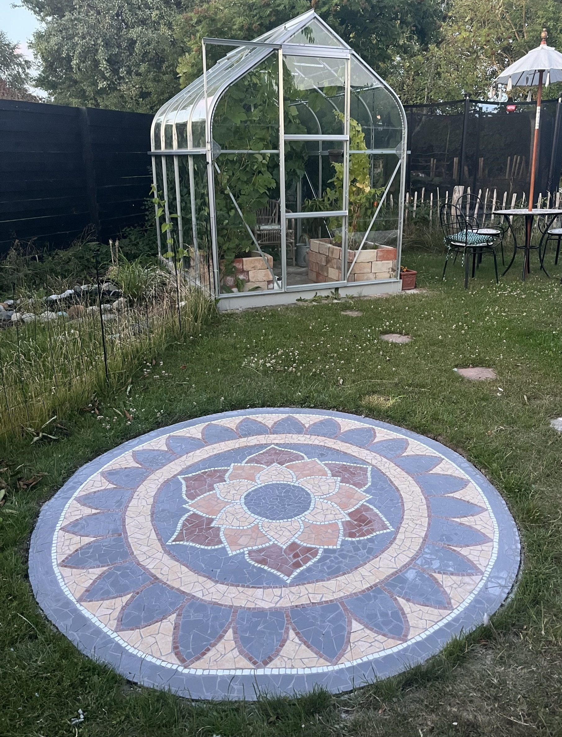 Rund mosaik terrasse