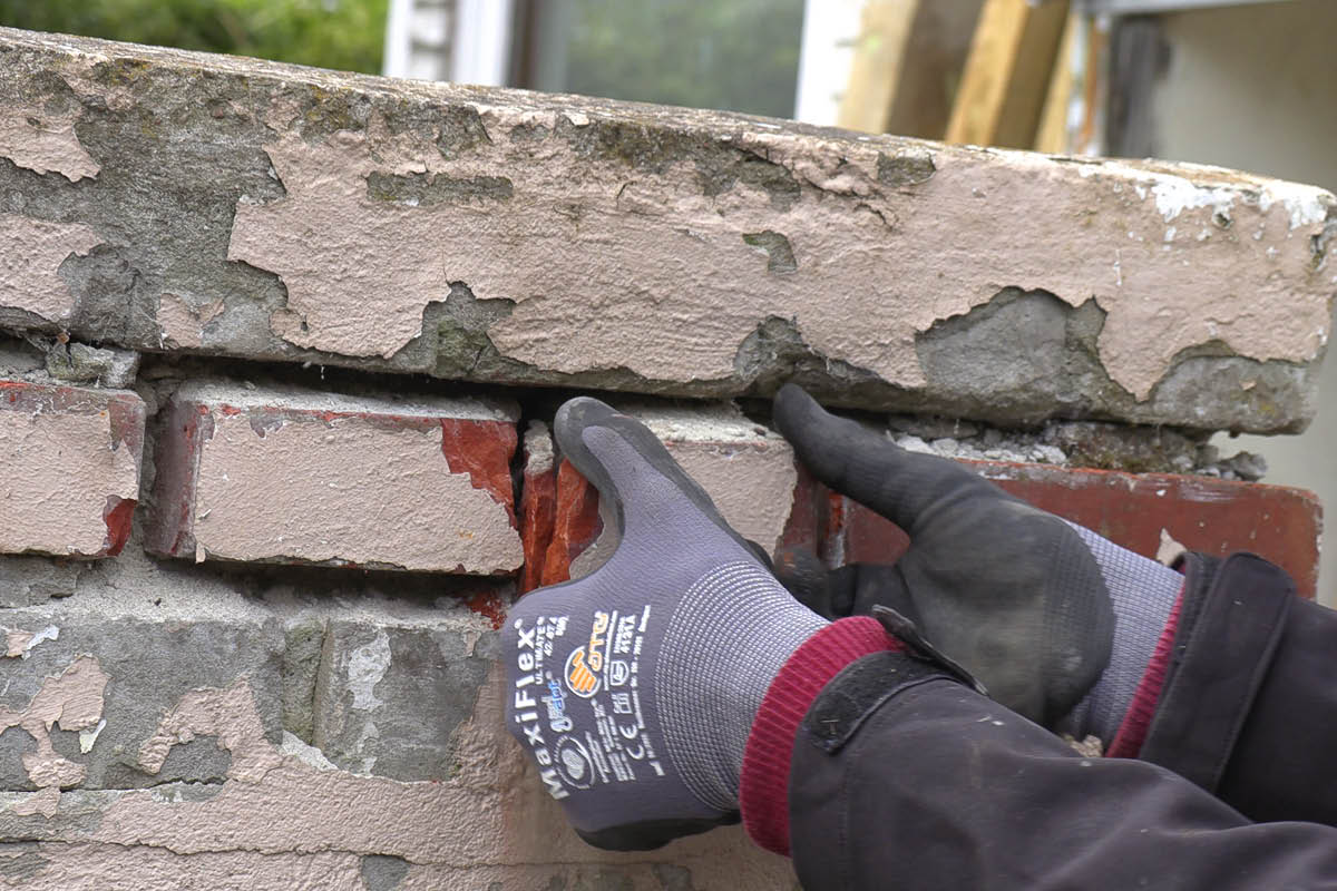 Byta tegelsten i fasad