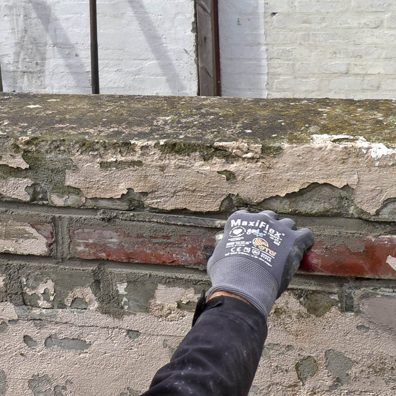 Pris för utbyte av tegelstenar: Jämna till fogen