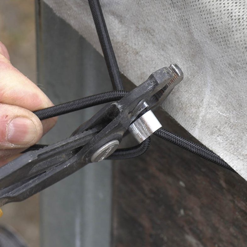 Peräkärryn peite: Purista vaijerilukot kiinni kuminauhaan