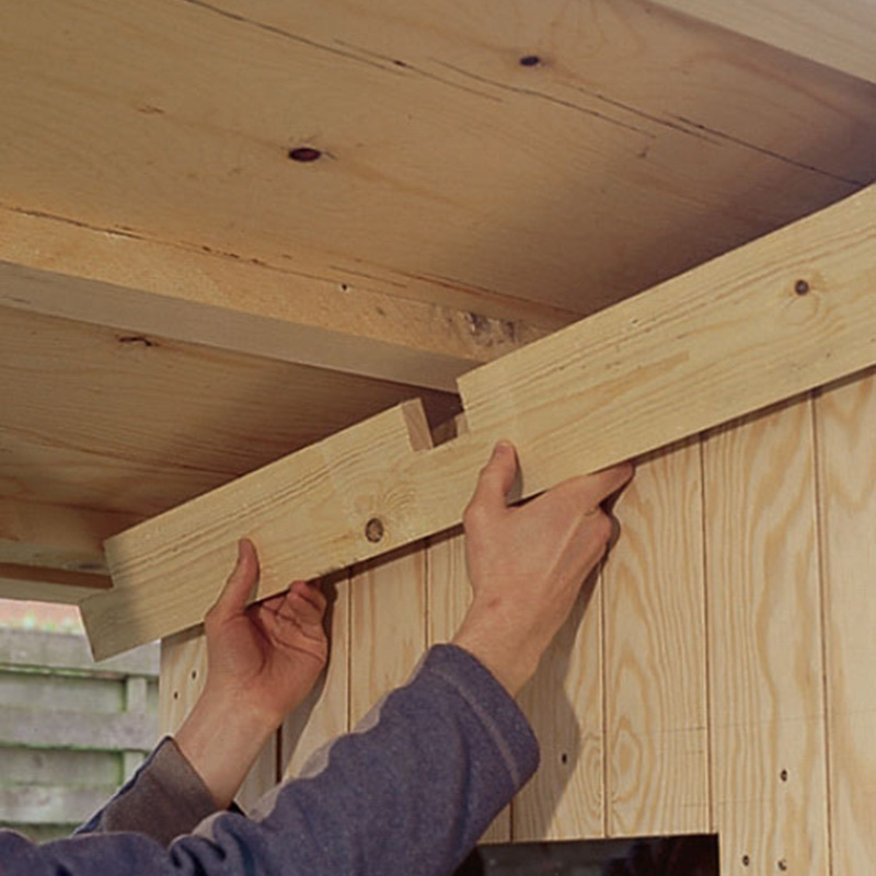 Kanatarhan rakentaminen: Katon ja päädyn välisen