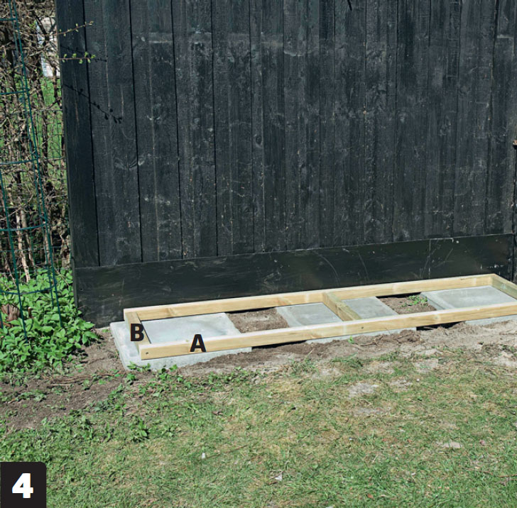 Lille vægdrivhus: Lav et fundament til bundrammen