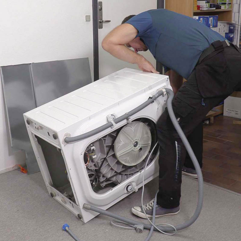 Avløpspumpe vaskemaskin: Legg maskinen ned