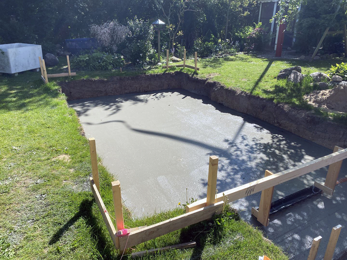 Nedgravet orangeri holder på varmen