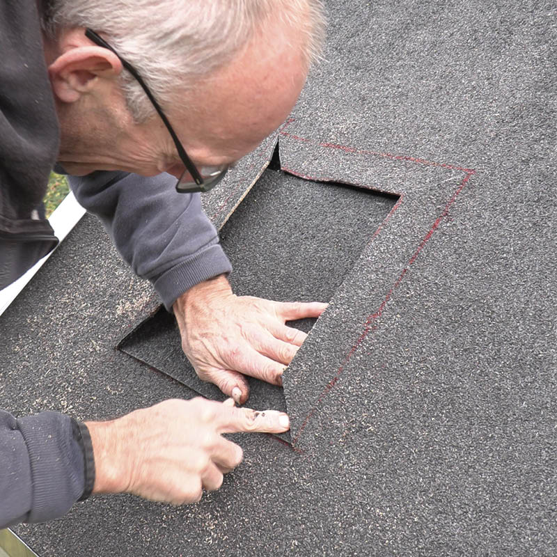 Hul i tagpaptag - efter skorsten