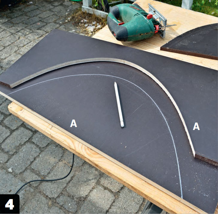 Tegn buen op på det andet sidestykke til garage til robotplæneklipper