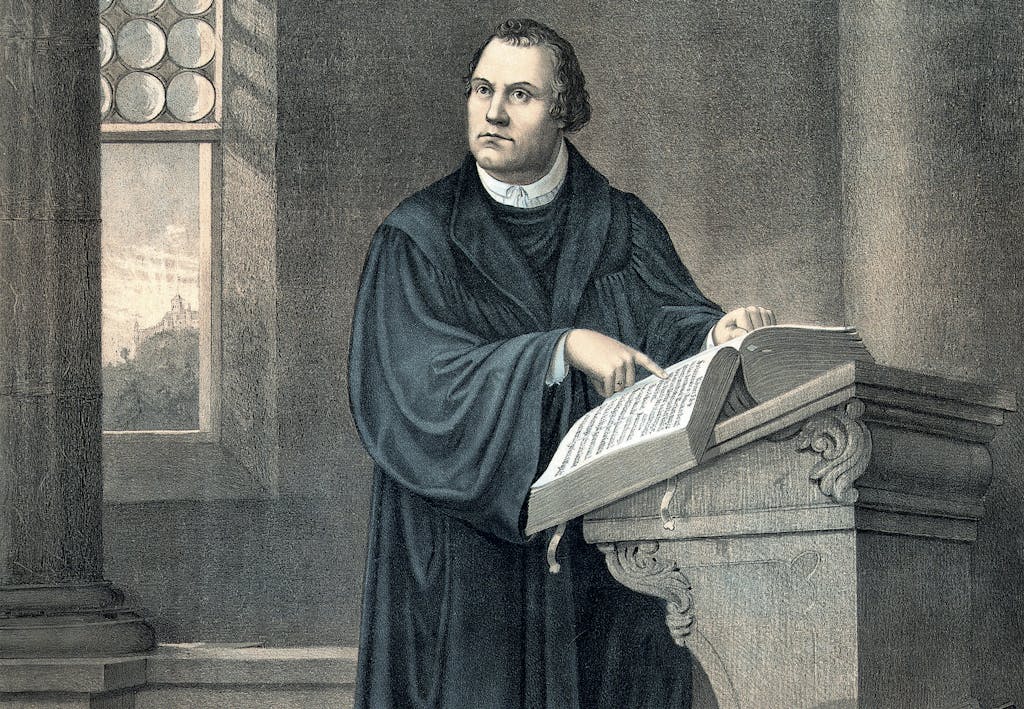 Uskonpuhdistaja Martti Luther saarnastuolissa.