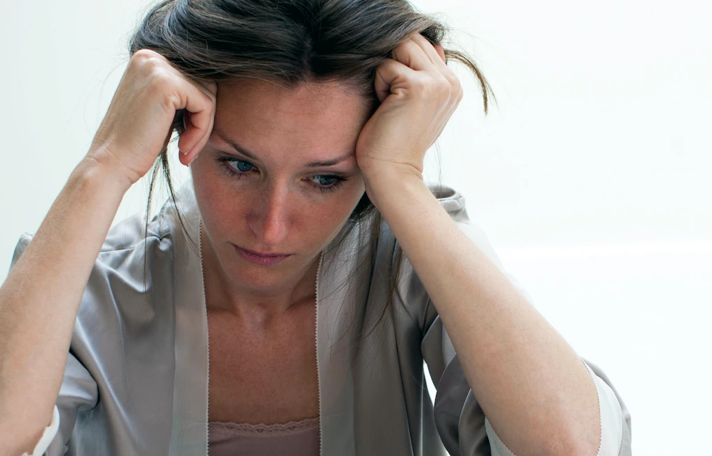 Nainen, jota vaivaa stressi