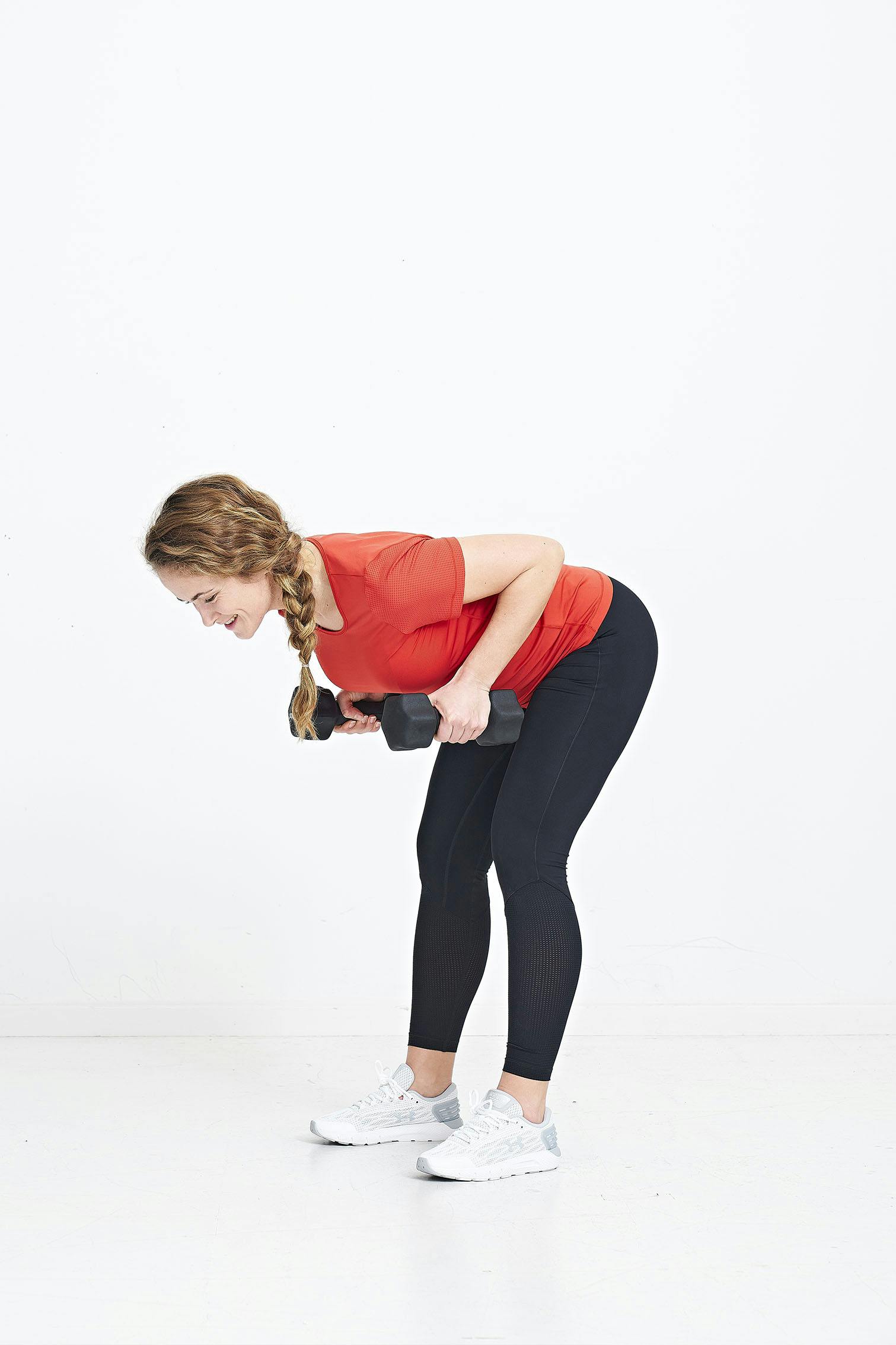 Kvinne med håndvekter