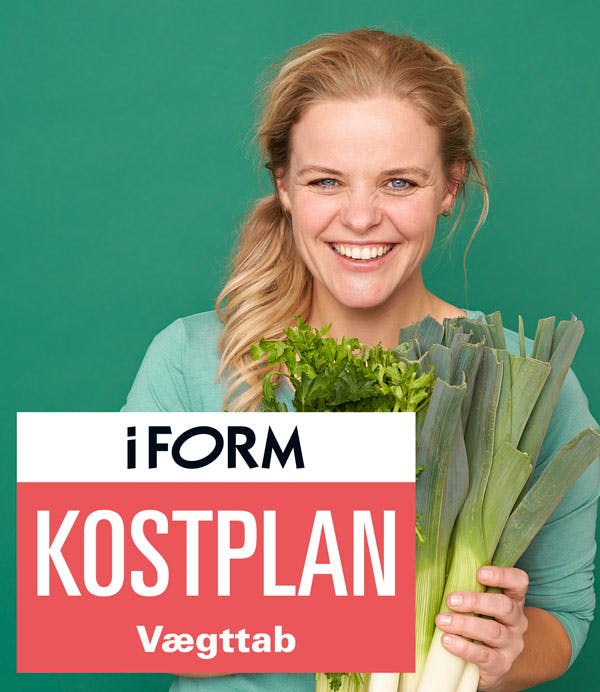 Glad kvinde skal i gang med kalorieberegnet kostplan.