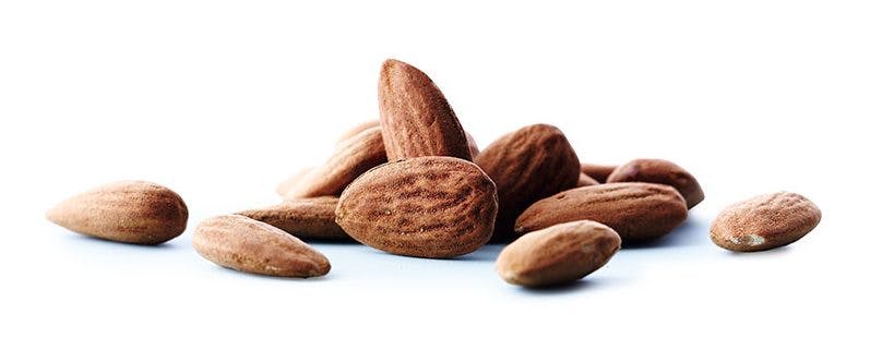 Put mandler i eller overn på grøden