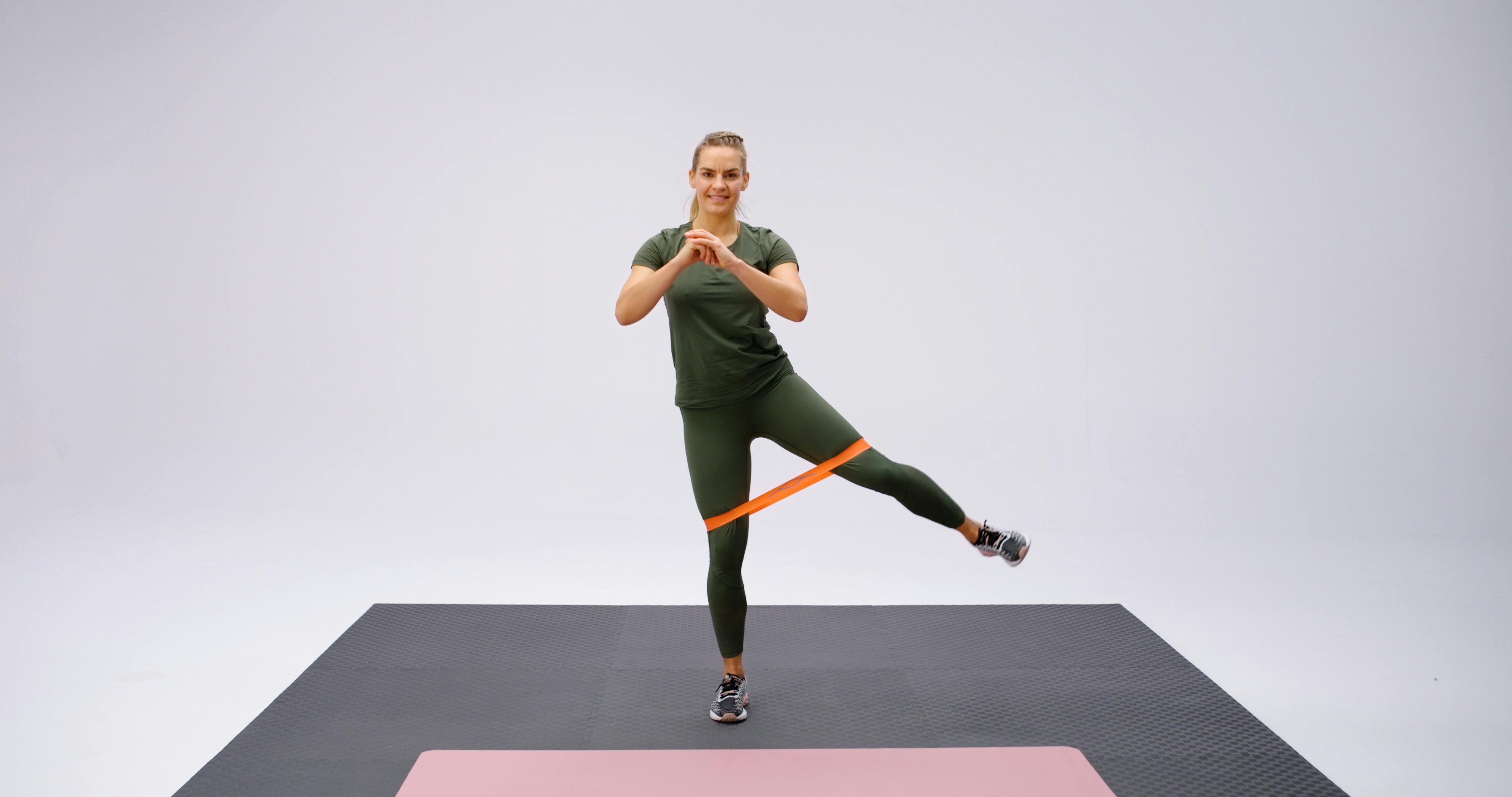 Squat med benløft med elastik -venstre