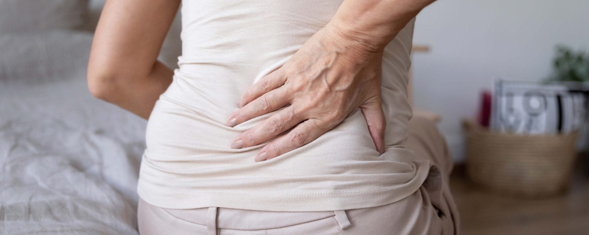 Kvinne med korsryggsmerter