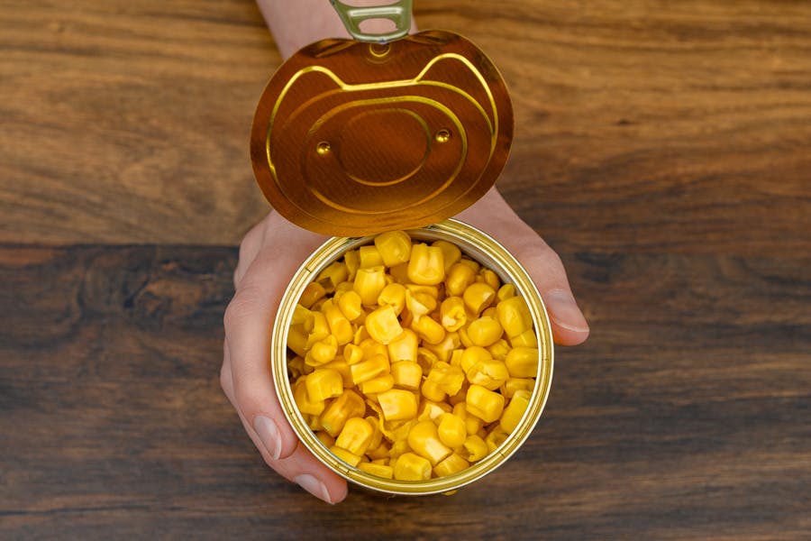Åbnet dåse majs, forstoppelse