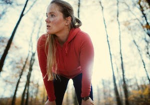 Utpumpad kvinnlig löpare