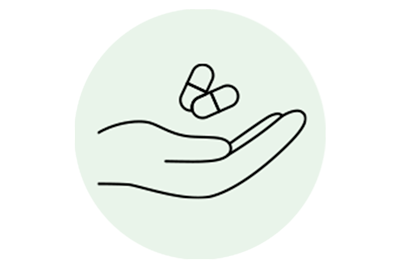 Piirros lääkekapseleista kädessä.