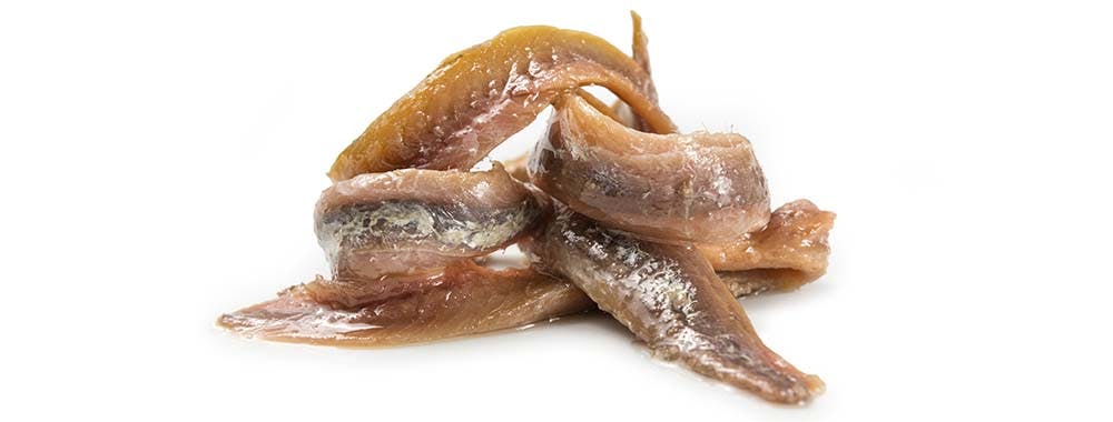 Ansjoser i cæsardressingen