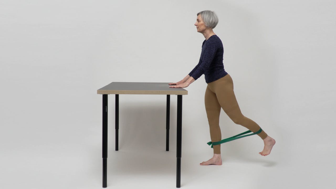 Kvinne som trener med artrose