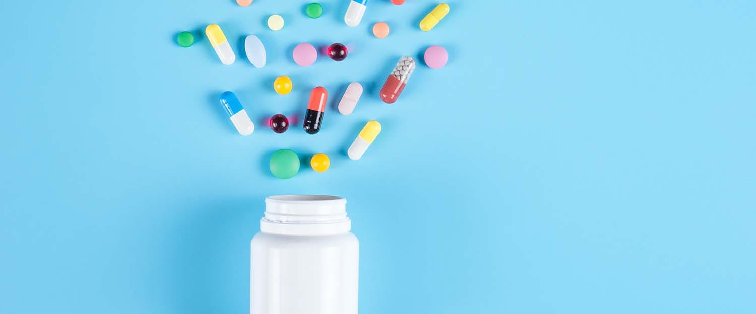 pillerburk med olika sorters smärtstillande tabletter