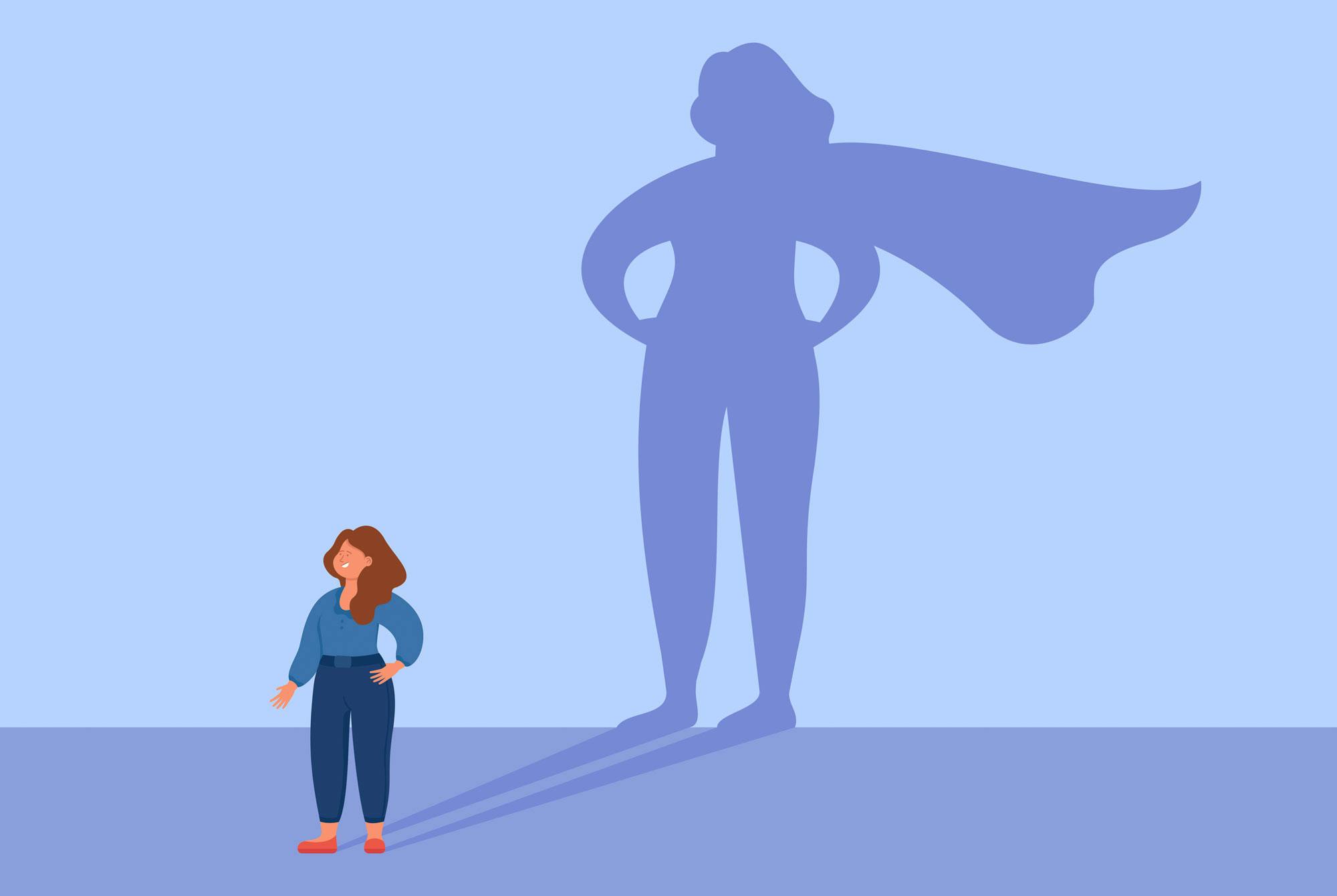 kvinde kaster superwoman-skygge i stolthed over vægttab