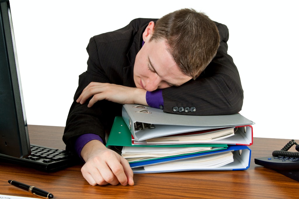 Tired man at work