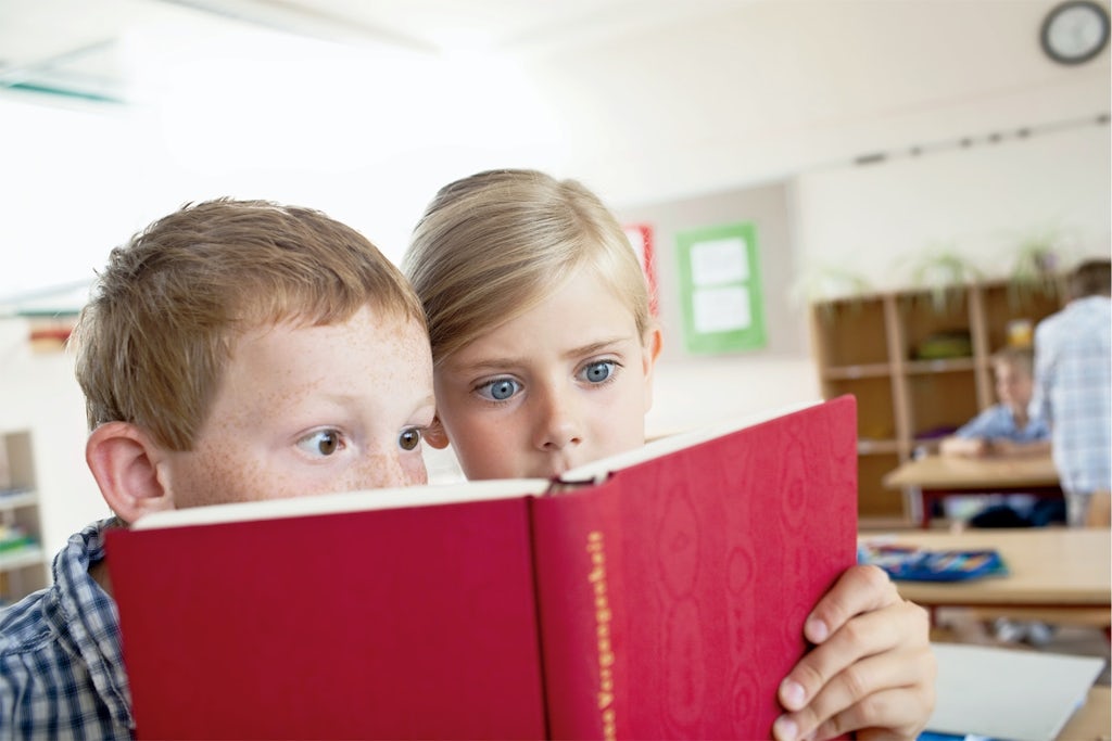 Boy and girl reading