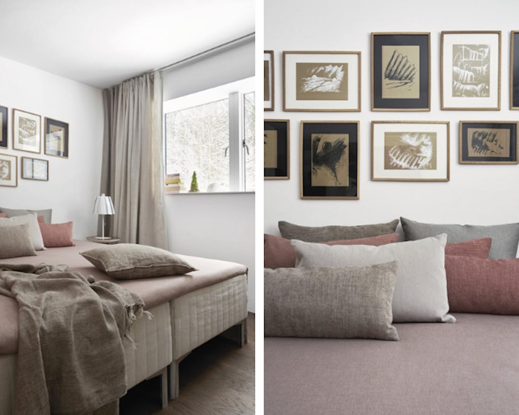 natuurlijke tinten regeren in de slaapkamer. Het bed is van Ikea, de kussens in bruin- en rozetinten zijn gemaakt door Karina met stoffen van Nevotex.